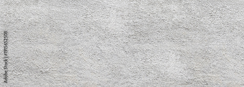 Rough white stucco wall texture background pattern