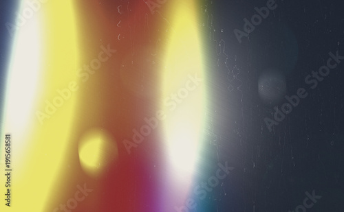 Abstract vintage film light leak with dust and scratches on a dark background
