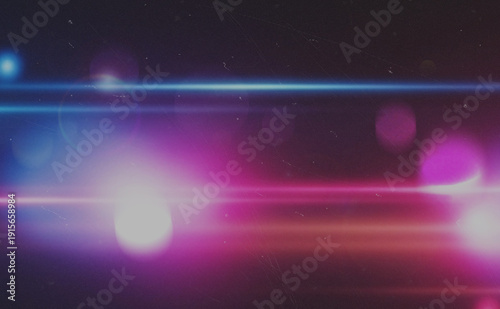 Abstract background with vibrant neon light flares and glowing bokeh effects on dark background.