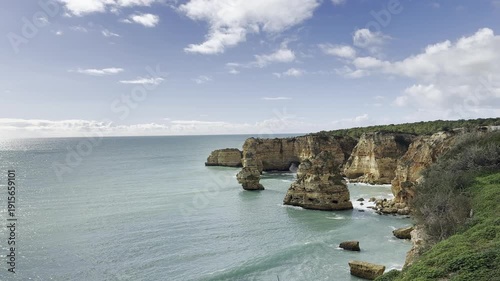 Aerial view of Marinha beach and Mesquita beach. Beautiful beach in the Carvoeiro, in Algarve, Portugal