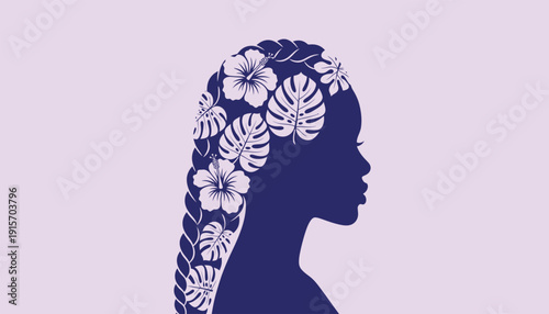Woman silhouette with tropical flowers in hair
