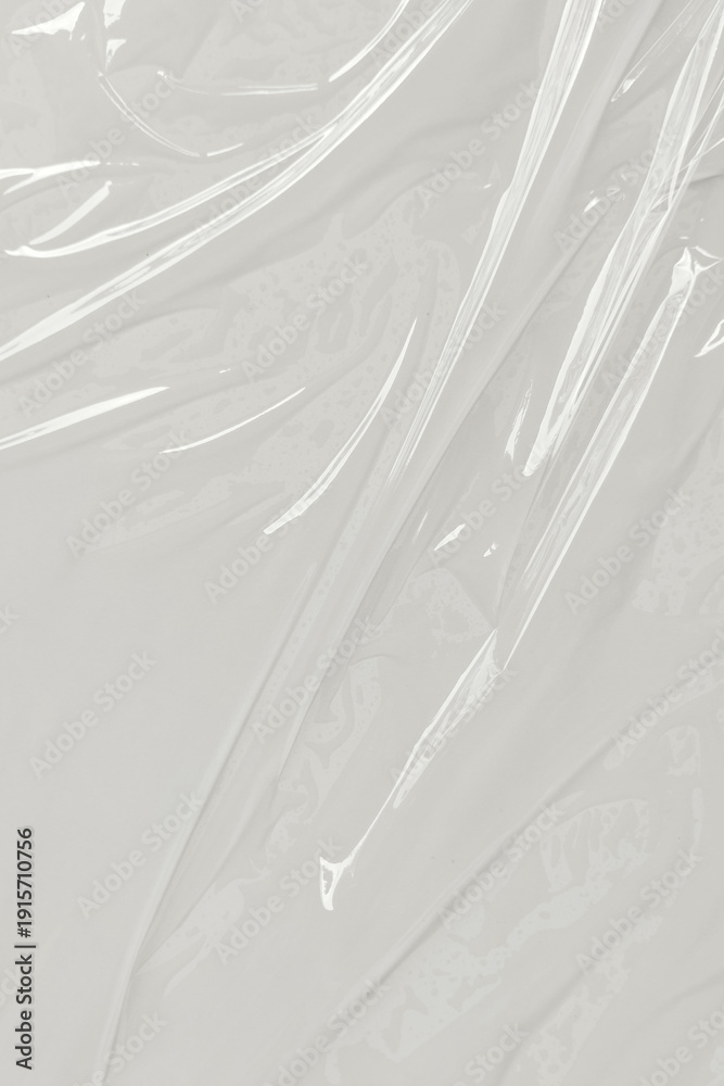 Fototapeta premium Plastic transparent cellophane bag on white background. White plastic film wrap texture background. White Plastic Bag Texture
