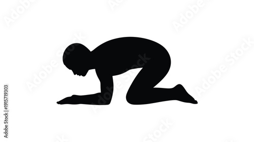 Person kneeling in prayer or meditation on the floor