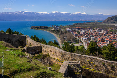 Vászonkép The ancient walls of Samuel's Fortress preside over the brilliant blue Lake Ohrid and the picturesque town, with snow-capped mountains completing the expansive vista in Ohrid, North Macedonia