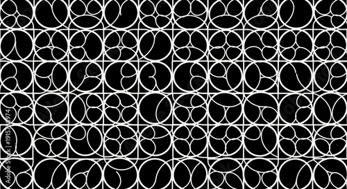 Intricate white floral pattern on black background viewed from directly above