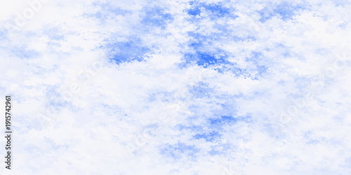 Beautiful blue sky with fluffy white clouds on a clear sunny day creates a natural summer cloudscape and a beautiful atmosphere in the bright outdoor air