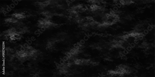 A dramatic black and white abstract texture of dark storm clouds rolling across a heavy sky during a moody nature weather time lapse