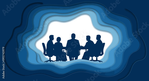 Group of professionals engaged in a collaborative discussion around a table, viewed from above in a modern office setting