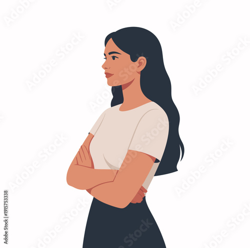 Young professional woman with dark hair stands in profile view with arms crossed, conveying confidence and determination.