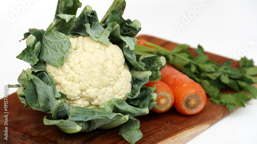 Cauliflower , brassica oleracea , bunga kol or kembang kol on cutting board
