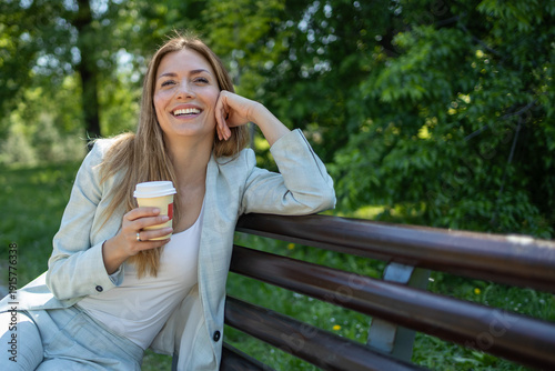  Businesswoman enjoying spring in the park