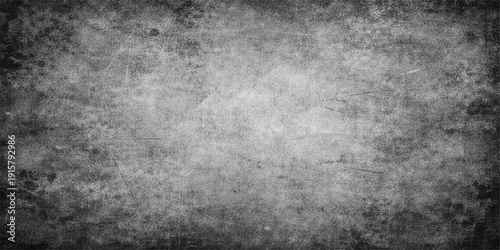 A dark vintage grunge metal background features a dirty black concrete wall texture with an aged rough stone surface and a grey textured pattern backdrop