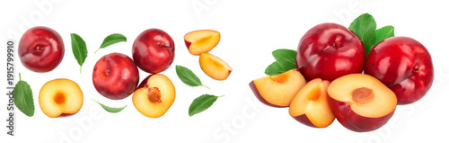 fresh red plum and half with leaves isolated on white background with copy space for your text. Top view. Flat lay