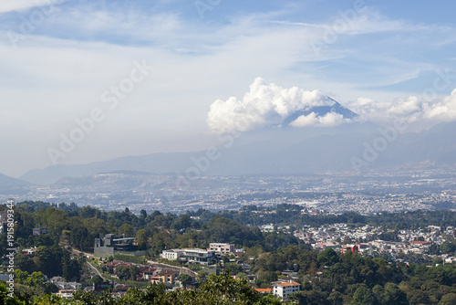 Guatemala high-rises facing distant volcanoes