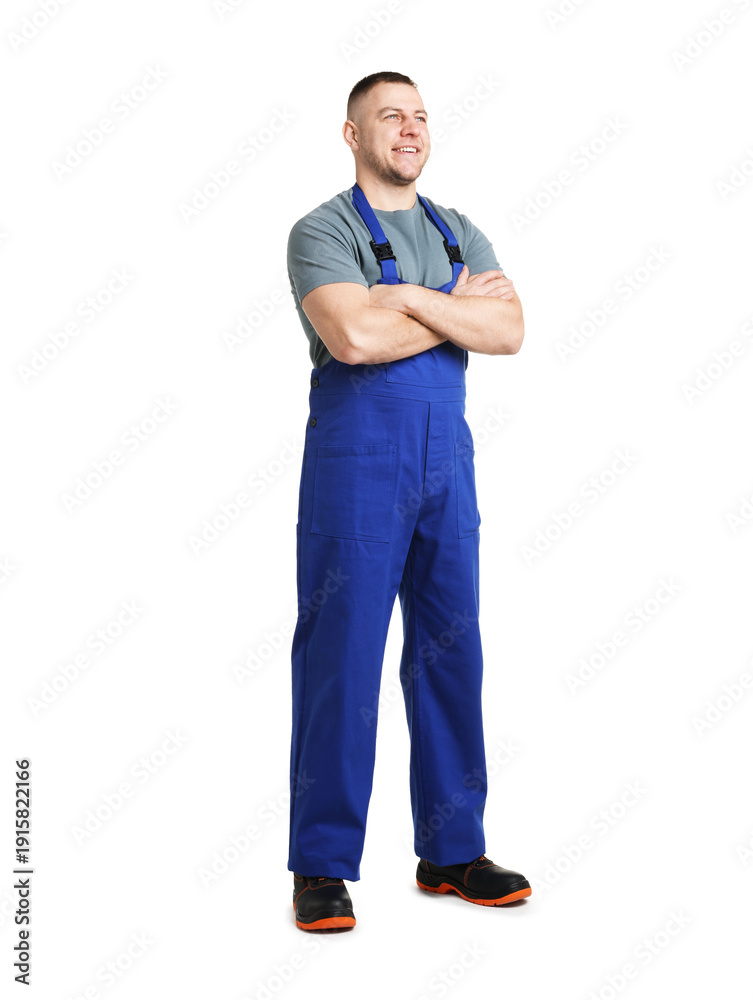 Fototapeta premium Handsome repairman in uniform on white background