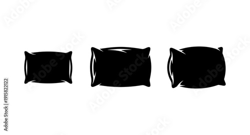 Three black silhouette pillows of different sizes on a white background