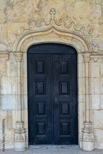 Wallpaper Mural Portugal, Lisbon - 05 Aug 2018: Antique Black Wooden Double Door Gothic Arch Torontodigital.ca