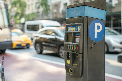 A close-up of a parking meter with a large 