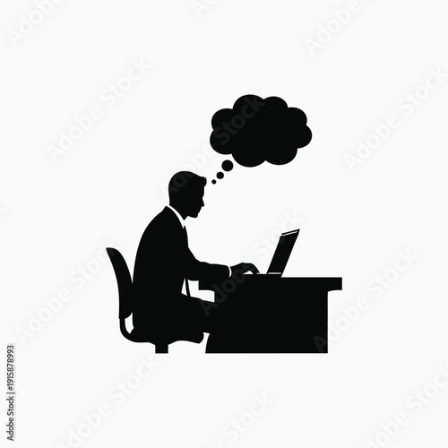 Man sitting at desk with laptop, contemplating ideas, in a thoughtful state, viewed from the side