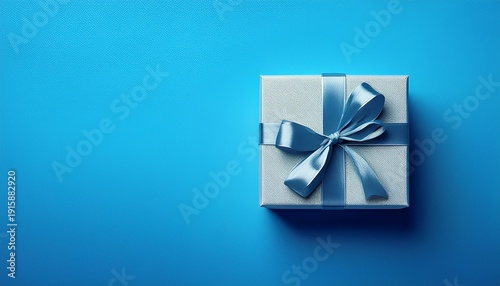 Minimalistic Drawing Of Gift Box With Copy Space Isolated On Blue Background