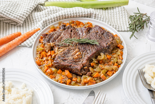Obraz na plátně Hearty American food. Beef pot roast with roasted veggies