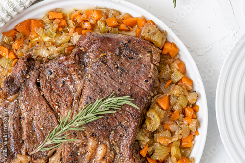 Obraz na plátně Hearty American food. Beef pot roast with roasted veggies