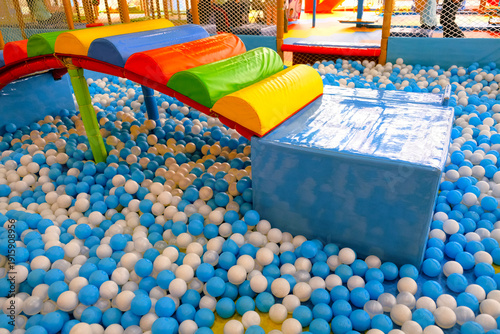 Wallpaper Mural Kids playground, playroom. Dry pool with colorful balls and trampoline. Children playground for sports, activity and play Torontodigital.ca