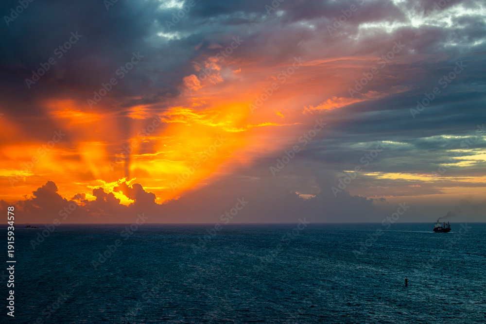 Fototapeta premium People watching sunset on cruise ship deck