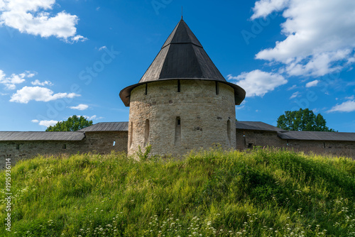 Obraz na plátně Izborsk Tower of the Holy Dormition Pskov-Pechersk Monastery on a sunny summer d