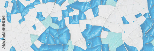 Blue peeling paint on the wall. Old concrete wall with cracked flaking paint. Weathered rough painted surface with patterns of cracks and peeling. High resolution texture for background and design.