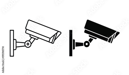 Two security cameras in different colors on wall mounts