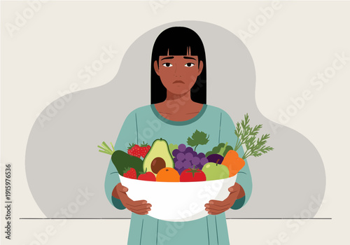 A woman with a sad expression holding a large bowl filled with fresh fruits and vegetables, promoting healthy eating.