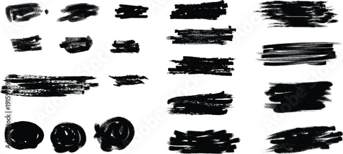 Collection of black brush strokes and smudges on a white background