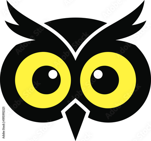 Black owl face with large yellow eyes and white pupils