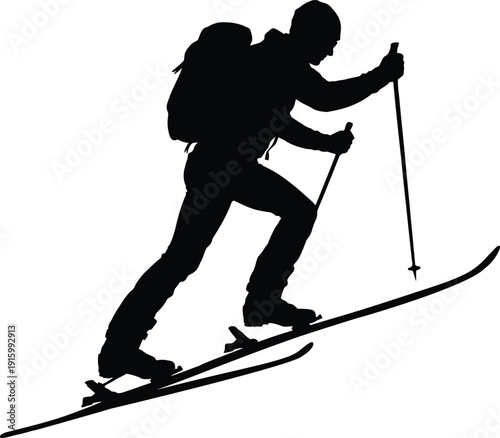 Silhouette of Backcountry Skier Climbing Uphill with Poles