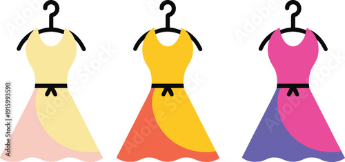 Three colorful dresses on hangers