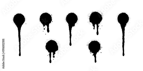 Five black ink drips with varying lengths and shapes isolated on a white background
