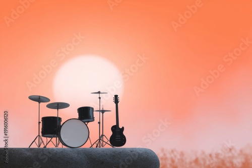 silhouette of a rock band stage with a drum set, guitar, and microphone. orange background.