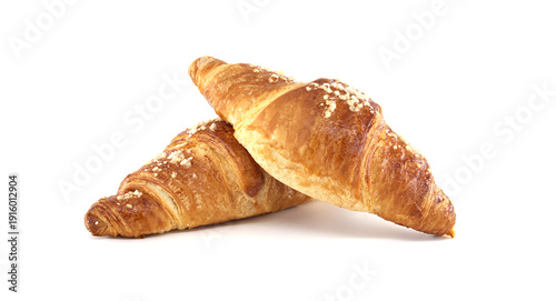 Two golden croissants topped with coarse sugar on a clean white background for bakery uses