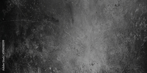 A grayscale abstract texture displays a weathered surface with subtle gradients and hints of organic patterns