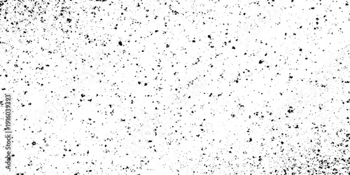 White speckled texture with scattered black dots abstract grunge background black distressed elements, grit, and grainy speckles.