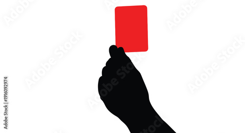 A hand holding a red card stark contrast black silhouette