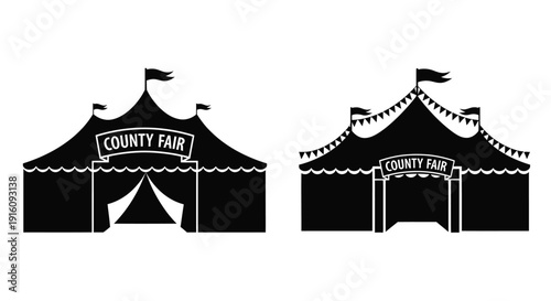 Two county fair tents with flags a striking black silhouette
