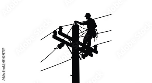 Lineman working on high voltage power lines a striking silhouette
