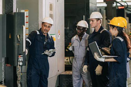 Photography Professional senior engineer man training young engineer team to control operate