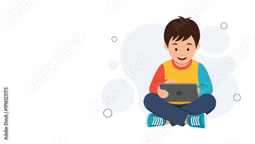 Young Boy Sitting Cross-legged Using Tablet Computer, Smiling
