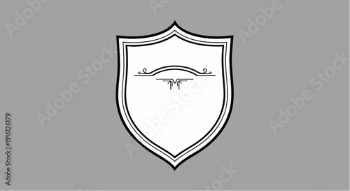 Blank Shield Emblem with Decorative Elements.