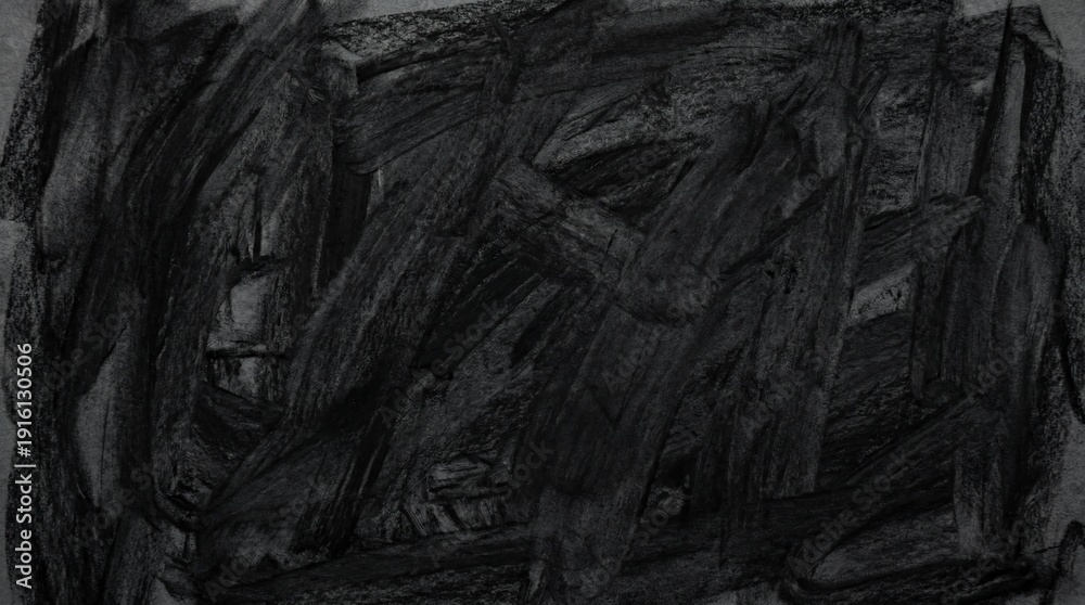 Fototapeta premium Abstract texture features heavily layered, dense, dark charcoal markings creating an organic, fibrous visual pattern across the frame with intense depth.