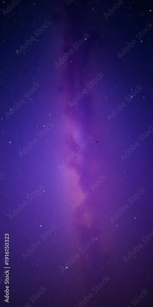 Fototapeta premium Starry night sky with glowing band of the Milky Way and soft violet hues, space, starry sky