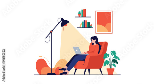 Young woman sitting in a comfortable armchair working on a laptop late at night under the light of a floor lamp in a cozy home office.